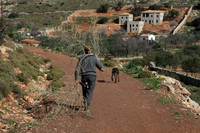 A man walking down from the mountain