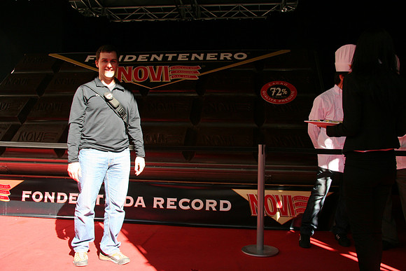 In front of large chocolate bar - trying to break a world record, 3000 kg