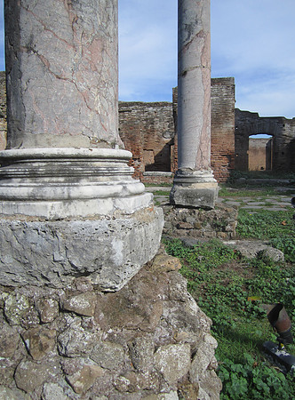 Column bases on something else. Cities like Ostia continually built on previous structures.