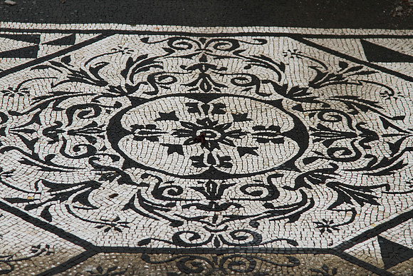 Closeup of a mosaic floor pattern.