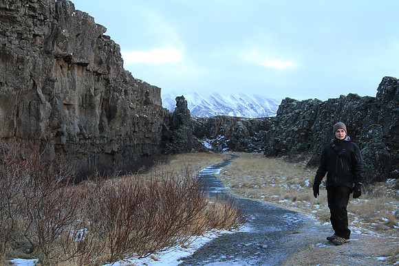 Walking in a riff created as tectonic plates pull apart. It gets wider by 2 cm a year they say.