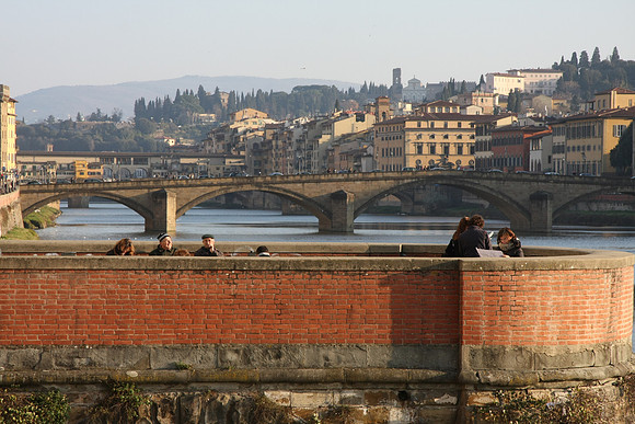 West of the Ponte Vecchio by several bridges