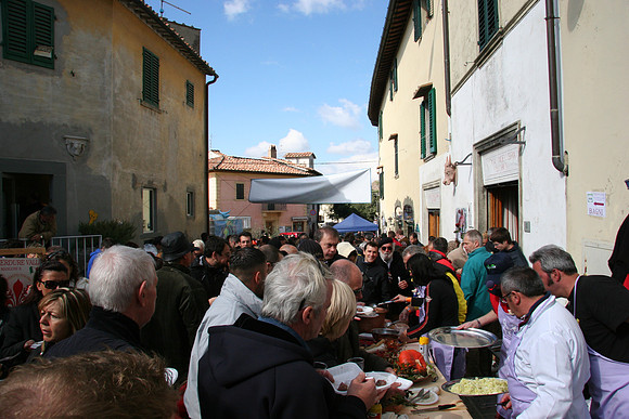 Marc at end of table getting food