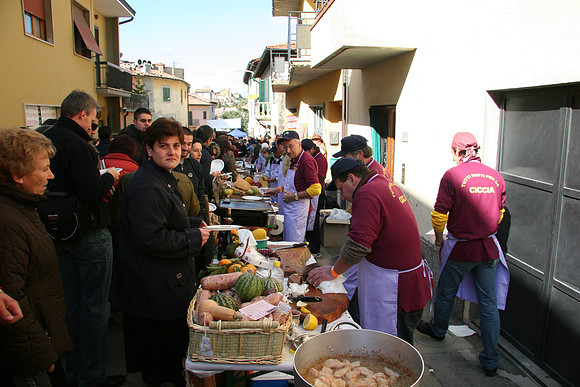 Mark on the left trying to fill up his plate, veal in the fryer in foreground