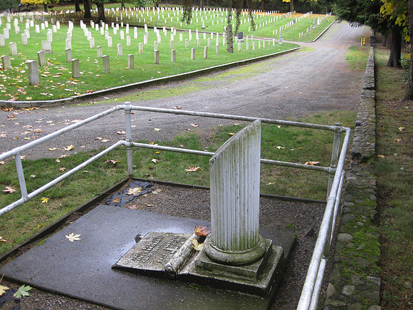 Grave of Guiglemo Olivotto - an Italian who died in a riot at the fort in 1944.