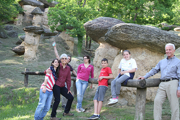 Posing in front of the mushrooms.