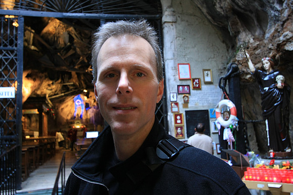Over Mark's shoulder are ex-votos