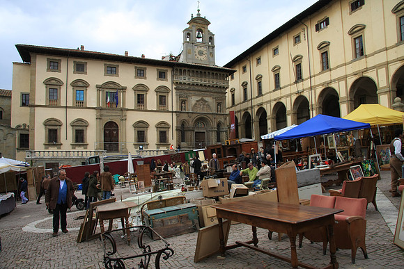 Piazza Grande with the Antique Fair held each month.
