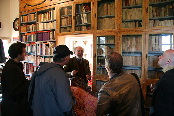 The owner of the vinicola gives us a tour of his library (some books over 300 years old)