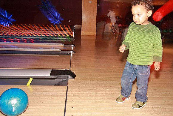 Zach rolls the ball down the alley - he actually got some strikes.