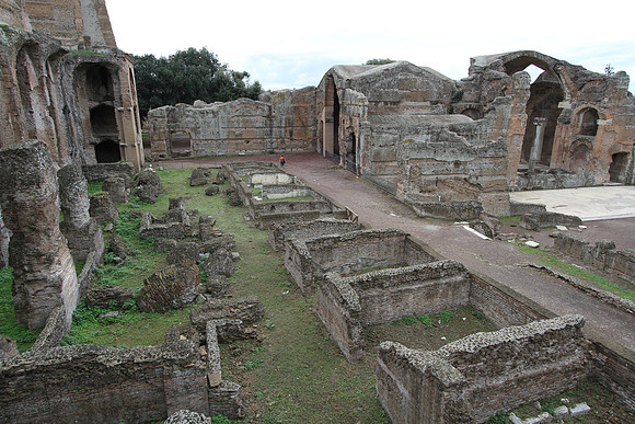 Praetorium (storage) to the left, public baths to the right. Marc is the little spot of orange walking.