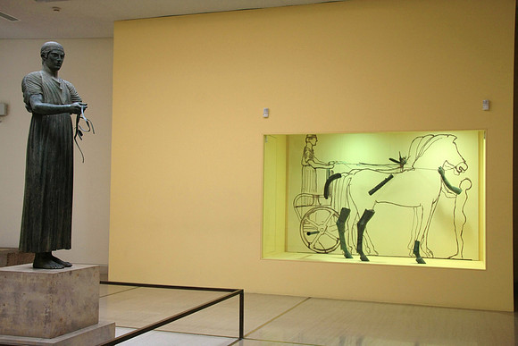 The bronze Charioteer has his own room.