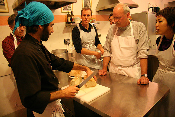 Cutting up bread for both soups