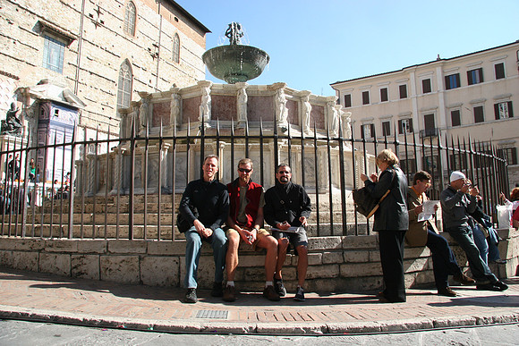 In front of the fountain
