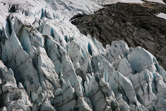 Blue-ish color typical of glaciers can be seen.