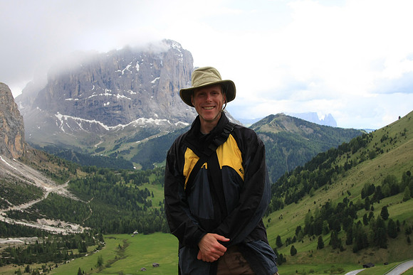 Mark with Sassolungo Group in background -we are at the Passo Gardena looking into the next valley
