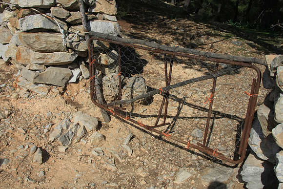 An old bed frame as a gate, went through a lot of these