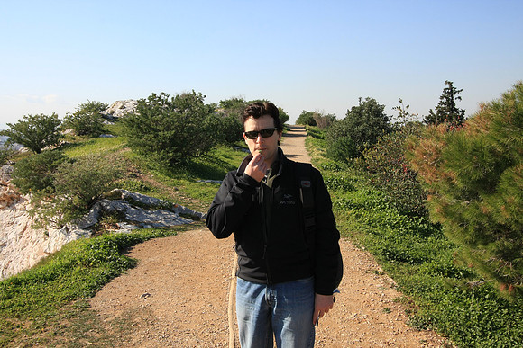 Tasting the wild arugula on Filopappas Hill. You're in the heart of the city and the views are great