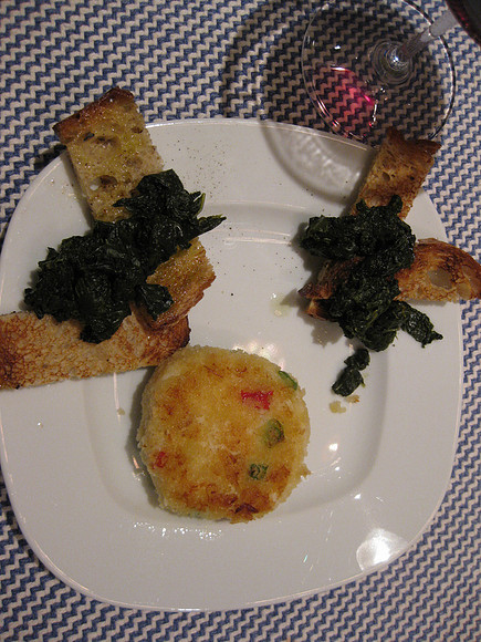 Crab cake and cavalo nero (kale) on toasted bread.