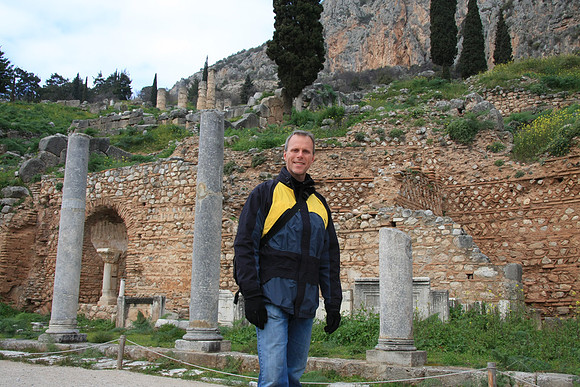 On the main road called 'the sacred way'.
