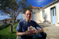 Eating lunch at an abandoned house.