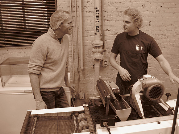 Mark discusss the old German enrober (circa 1930s) with one of the confectioners