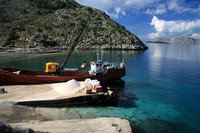 A boat yard near Kimomeni. Unloading sand.