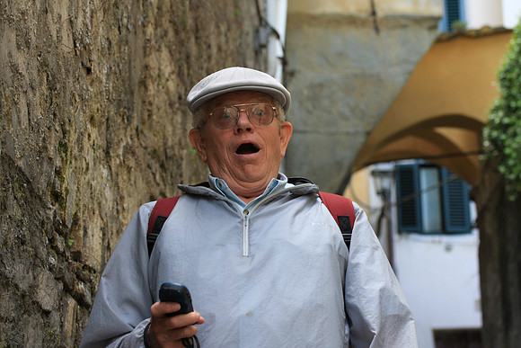 Noah taking a picture of man who stopped to ask for directions - poor fellow. (I love this picture.)