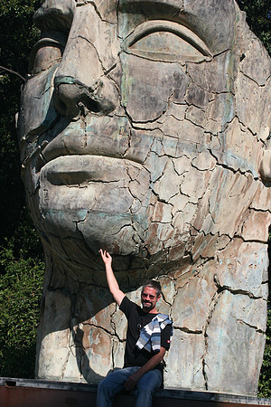 Tim tickles the Mitoraj sculpture