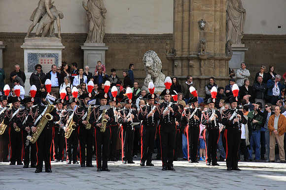Marching Band enters from another direction.