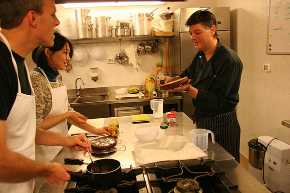 Spreading the marmellata (apricot jam) filling